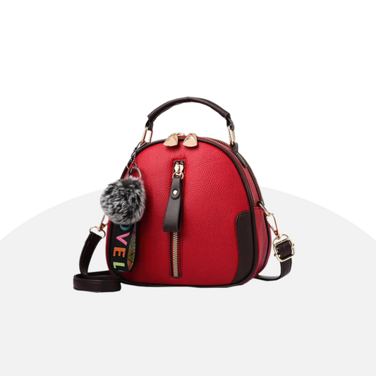 Chic Dome Crossbody Bag with Pom-Pom Charm