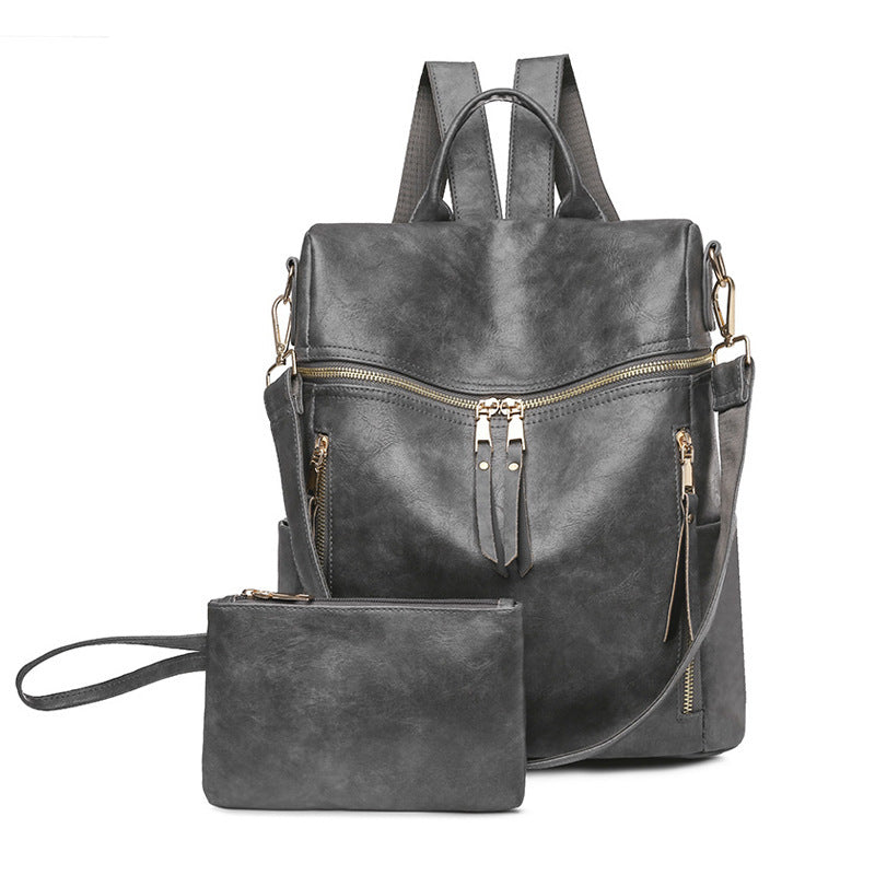 Chic Faux Leather Backpack with Wristlet - Stylish & Versatile Combo